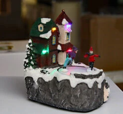 Lighted Holiday Moving Village 5.5 Inch - Ice Skaters