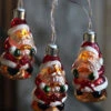 Battery Operated Antique Santa Glass String Lights - 10 Lights 1 Battery Operated Antique Santa Glass String Lights - 10 Lights -Decorative Candle Shop 2359650 santa