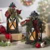 Set Of 2 Battery Operated Lighted Christmas Metal Holiday Lanterns With Floral Accents And Timer 1 Set Of 2 Battery Operated Lighted Christmas Metal Holiday Lanterns With Floral Accents And Timer -Decorative Candle Shop 2491810 main image