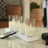 Rechargeable Moving Flame Set Of 4 Clear Glass Votives With Charging Base And Remote