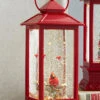 Red Lighted Snow Globe With Cardinals In Swirling Glitter - 11 Inch -Decorative Candle Shop melrose red lantern with cardinals