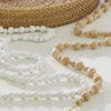 White Wooden Bead Garland 6 Foot - New From RAZ -Decorative Candle Shop natural20and20white20wood20beads20glam202