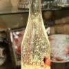 Lighted Wine Bottle With Swirling Glitter Peace Poinsettia Design With Cardinals Snow Globe -Decorative Candle Shop peace bottle
