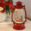 Red Hurricane With Santa And Sleigh Lighted Water Lantern - Timer 1 Red Hurricane With Santa And Sleigh Lighted Water Lantern - Timer -Decorative Candle Shop santa red hurricane water globe