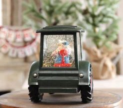 Lighted Green Tractor Water Lantern With Santa In Swirling Glitter 11 Lighted Green Tractor Water Lantern With Santa In Swirling Glitter -Decorative Candle Shop tractor back view